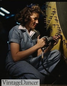 1942 Riveter at work on Consolidated bomber 1940s Rosie the Riveter coveralls