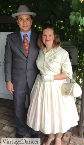 Oscar wears a 1940s suit (Roger Sterling style) and I in a vintage 1950s dress