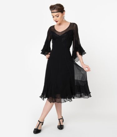 1920s bell sleeve flutter black party dress. WOW!