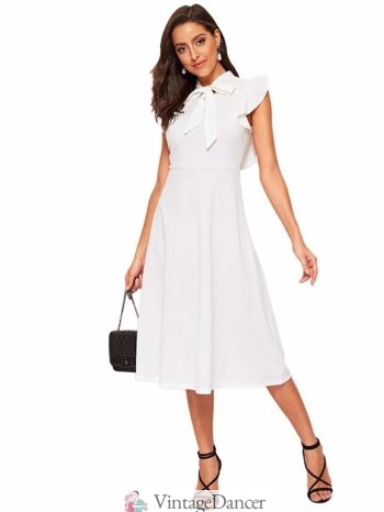 A white tie neck dress is almost 20s tennis dress day dress