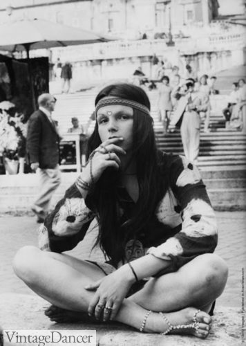 Long hair with a headband was a signature look for hippies in the 60s and 70s