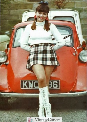 1960s teenager mod style - Turtle neck top, plaid mini skirt and go go boots