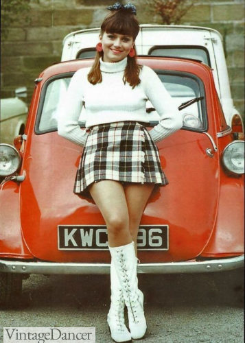1960s teenager mod style - Turtle neck top, plaid mini skirt and go go boots 