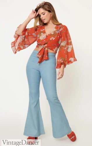 70s jeans bell bottom outfit with floral bell sleeve top in orange