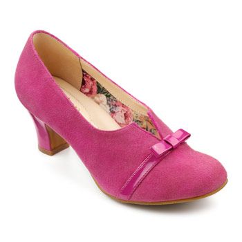 The Antoinette shoes in magenta. With their cute bow detailing, these are a lovely choice to suit 1950s feminine styles.