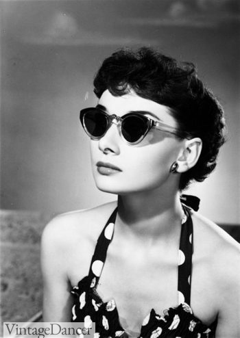 Audrey Hepburrn sports dark lenses sunglasses at VintageDancer