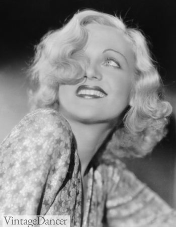 1930s long hair - Barbara Stanwyck peek-a-boo bangs with a long curly bob