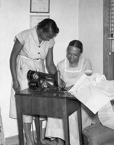 1950s black women sewing dresses