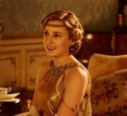 Downton Abbey's Edith wearing a 1920s beaded headband