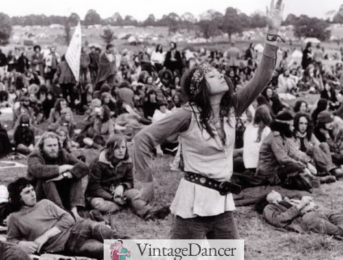 A hippie woman dances freely at the Woodstock Music Festival 1969 women's hippie fashion and culture