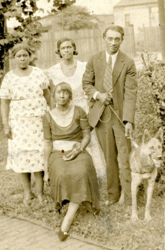 1930s fashion black women African American ladies and man with dog