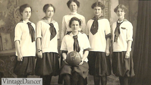 1920s George Fox university girls basketball team wearing middy tops and bloomer knickers
