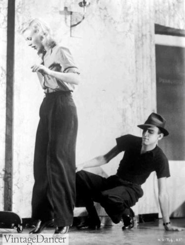 1930s Ginger Rogers rehearsing (for Swing Time) with Hermes Pan wearing wide leg slacks