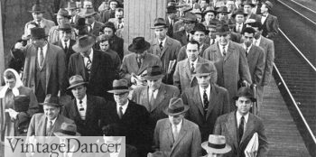 A sea of grey suits and fedora hats in the 1950s movie The Man in the Gray Flannel Suit
