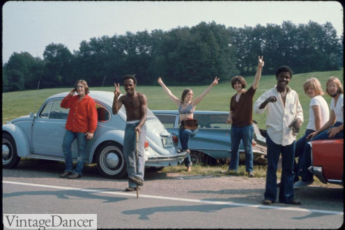 Hippies posing for a picture outside Woodstock 1969 at VintageDancer