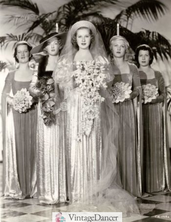 Jane Hamilton wears a round halo wedding hat with veil