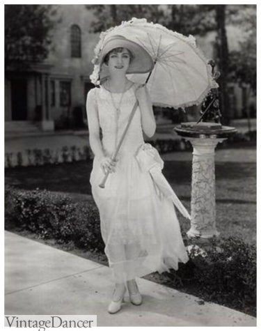 Josephine Dunn 1920s in a white dress with parasol