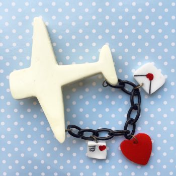 This Aeroplane pin by Mrs Polly's Lucite is a lovely reproduction of patriotic styles. 
