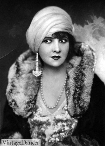 Lucy Doraine, Hungarian actress, wears a turban hat 1920s