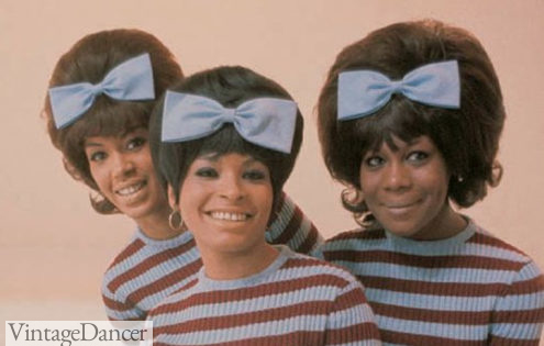 Early 60s Bouffant hairstyle with bow worn by the Marvelettes