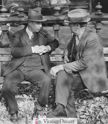 1938, men in suits with fedora hats