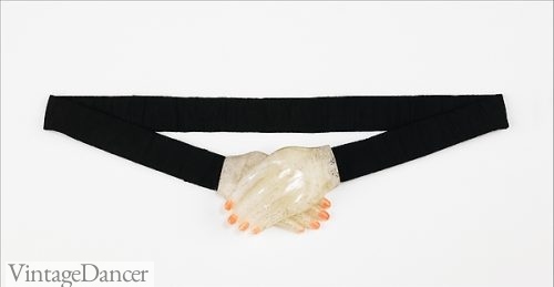 This 1934 evening belt by Schiaparelli demonstrates the increasing importance of the belt buckle. Image via The Met Museum - click to view the original entry.