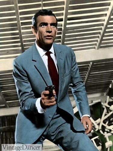 Sean Connery as James Bond wears a blue suit
