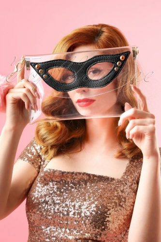 This wonderful clutch bag by The Pink Collar Life is the perfect balance of stylish and kitsch. Available to buy from Top Vintage.
