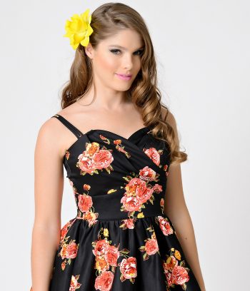 Add a pop of yellow to a vintage inspired outfit with this 1940s hair flower from Unique Vintage.