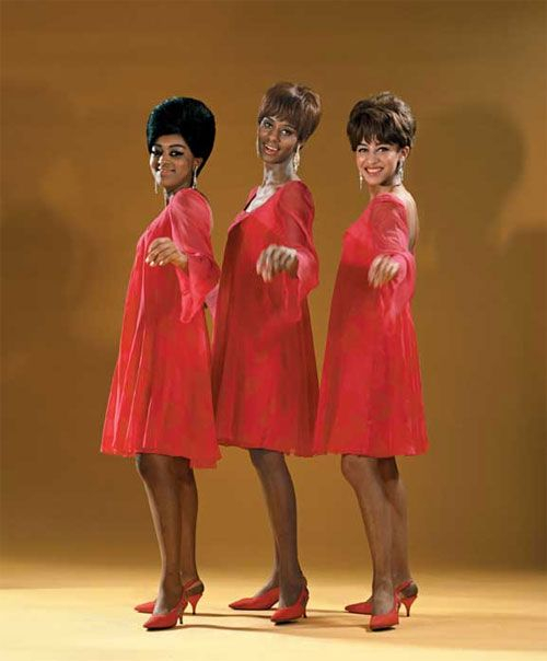 1960s fashion, cocktail dress Motown styleThe Velvelettes wear red tent dresses