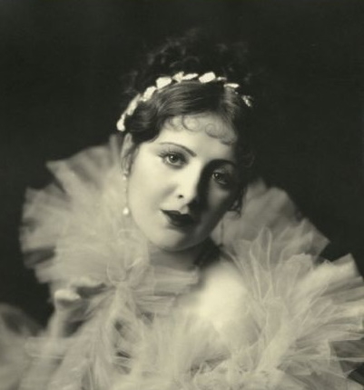 Billie dove with a headband of leaves