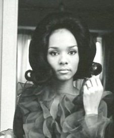 Long black hair in the 1960s flip hairstyles