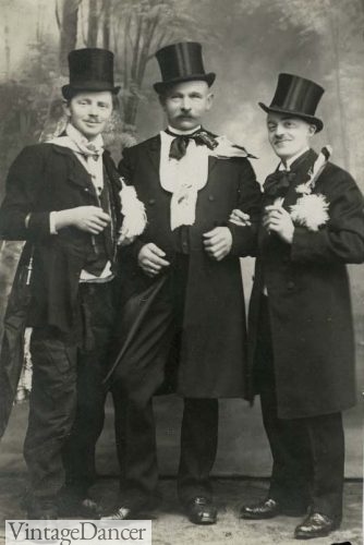Victorian Edwardian Dashimg men in suits with top hats (probably drunk too)