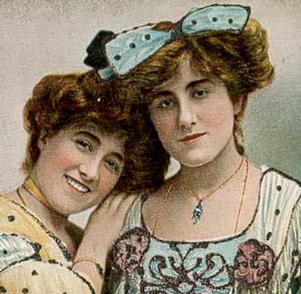 A hint of blue eyeshadow appears on these postcard ladies