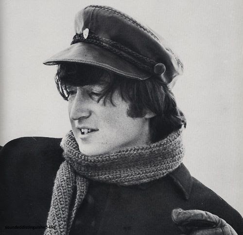 John Lennon, head of The Beatles, in a Greek Fisherman's Cap and Scarf 1960s mens hat styles