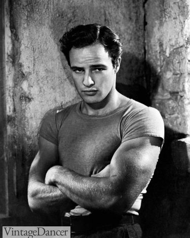 Marlon Brando from A Streetcar Named Desire, in a tight fitting white shirt and work trousers - at VintageDancer.com