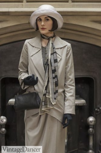 Mary Crawley in Downton Abbey wears a skinnny scarf knotted to the side of her neck