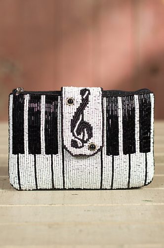 This music clutch by Mary Frances has the style and Wimsey of a '30s novelty purse