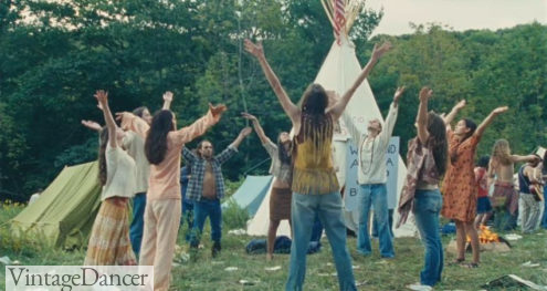 Hippies Performing a Rain Dance in a circle. The hippie women all show various styles acting as precursors to bohemian style.
