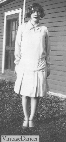 Mid 20s teen girl in a school dress